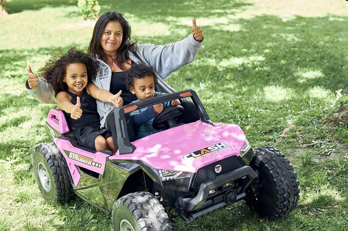 1 adult and 2 kids in the 24v dune buggy 